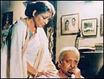 Supriya Devi and Soumitra Chatterjee in Atmiyo Swajan