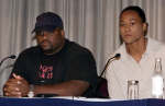 C.J. Hunter accompanied by his wife Marion Jones at the news conference. REUTERS/Gary Cameron 