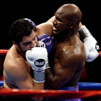 John Ruiz (L) and Evander Holyfield